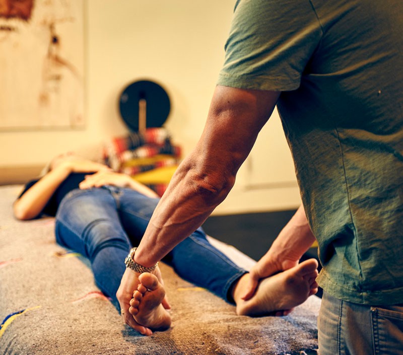 Online Breathwork Teacher Training JP Crimi Holding Feet - breathwork teacher training - online breathwork training
